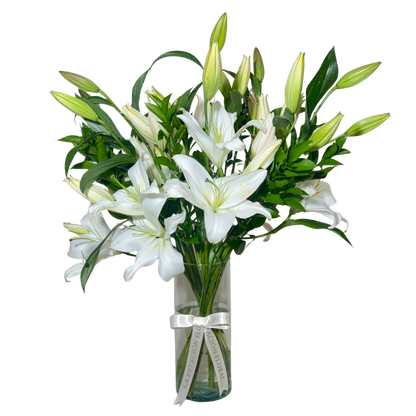 Casa Blancas en Florero con Follaje