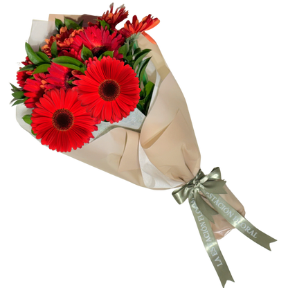 Ramo de Gerberas Rojas con Follaje